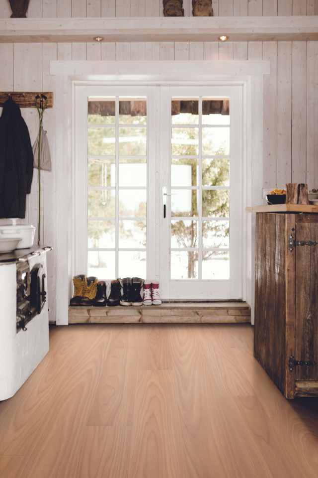 waterproof flooring in farmhouse style entryway with shoes